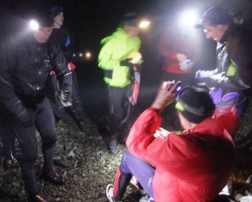 Night runners on the top of Morven on the shortest day of the year