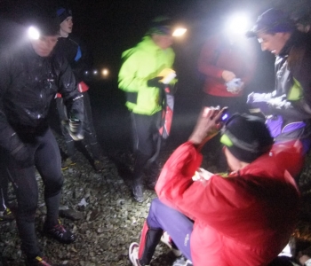 Night runners on the top of Morven on the shortest day of the year, 