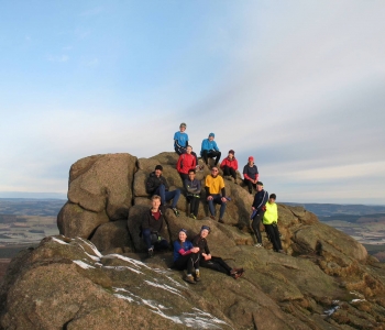 Maroc members having located crag top 15m, 